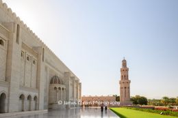 Exterior view with morning sun at Sultan Qaboos Grand Mosqure, Muscat, Oman