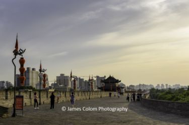 Walkers on the Xi'an City Wall at sunset, China