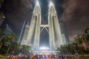 Petronas Towers lit up at night in Kuala Lumpur, Malaysia