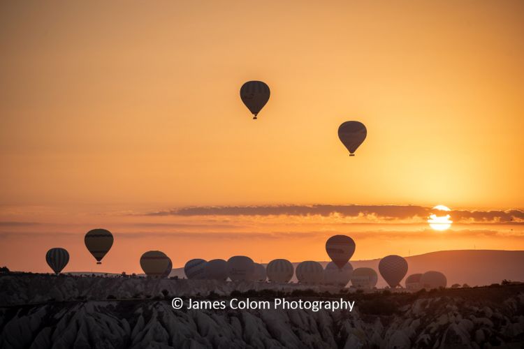 Hot Air Balloons at Sunrise from Goreme Viewpoint, Cappadocia, Turkey